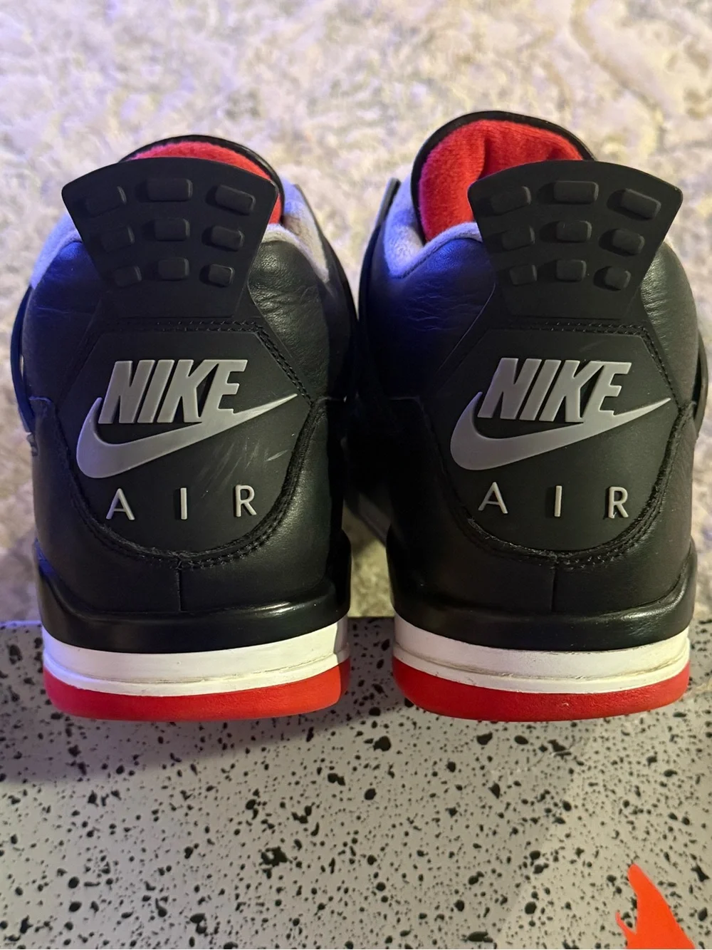 Jordan 4 Retro Bred Reimagined- Black/Red Retro-Style Sneakers